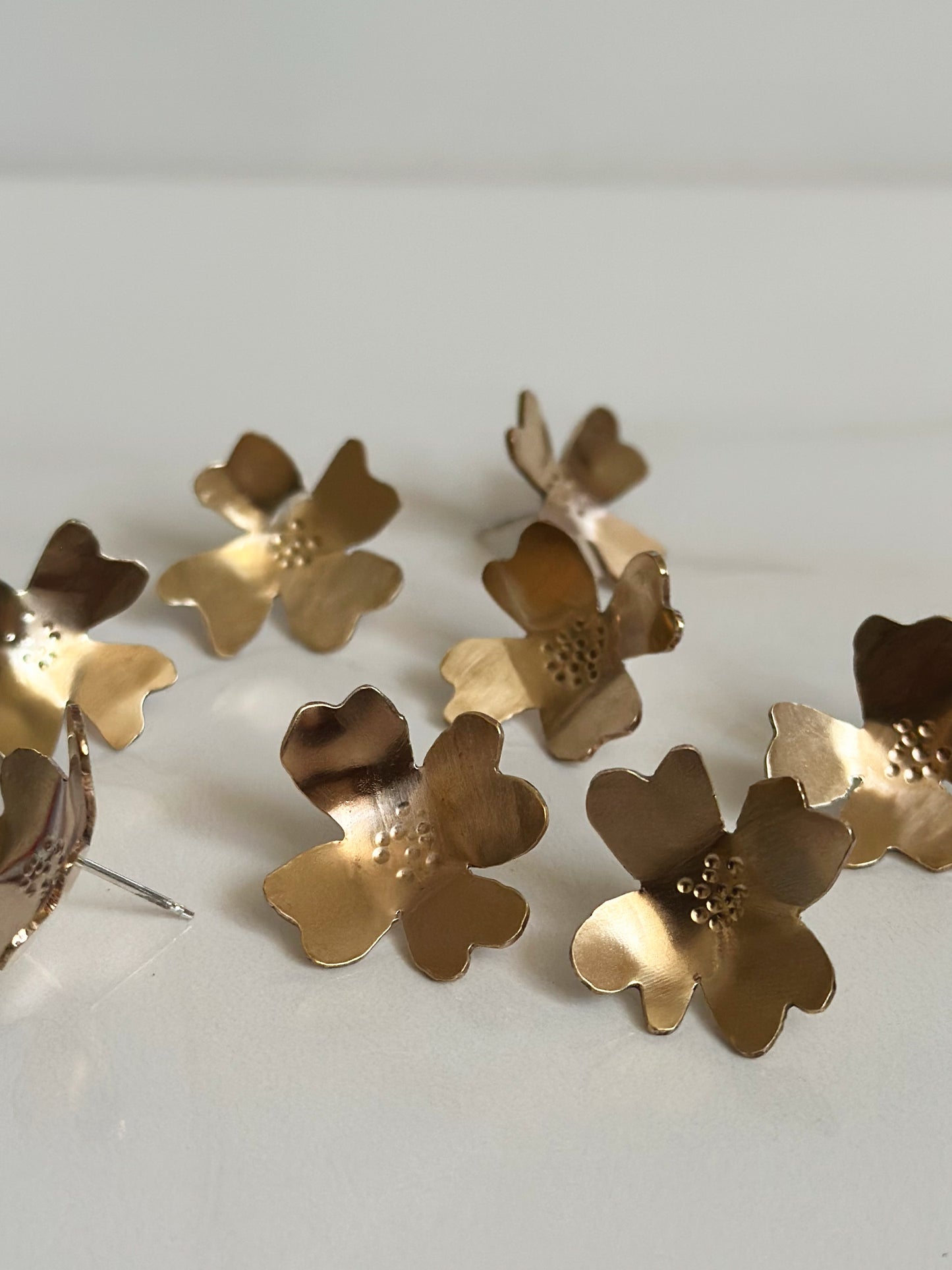 brass flower studs