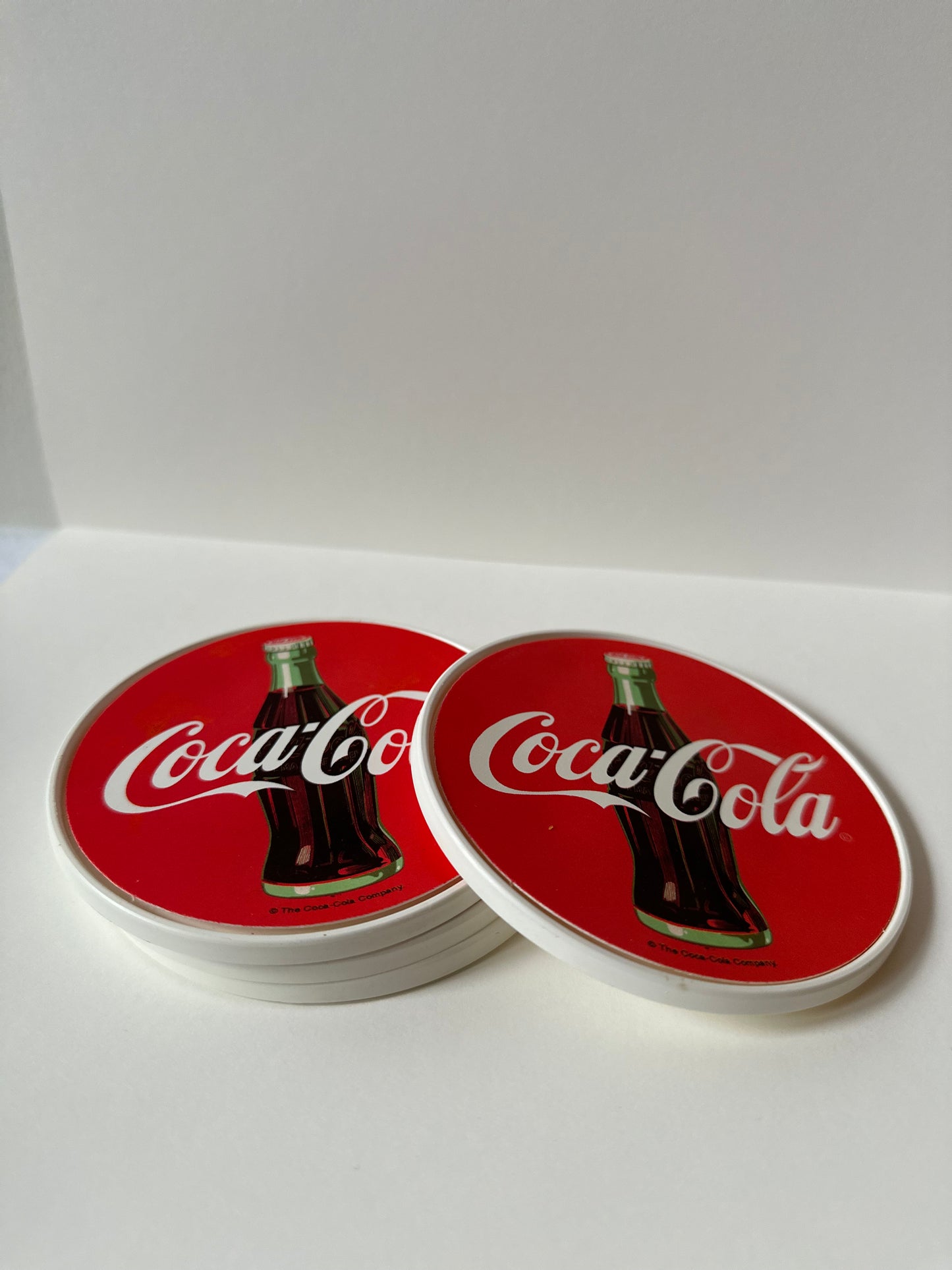 plastic coca-cola coasters