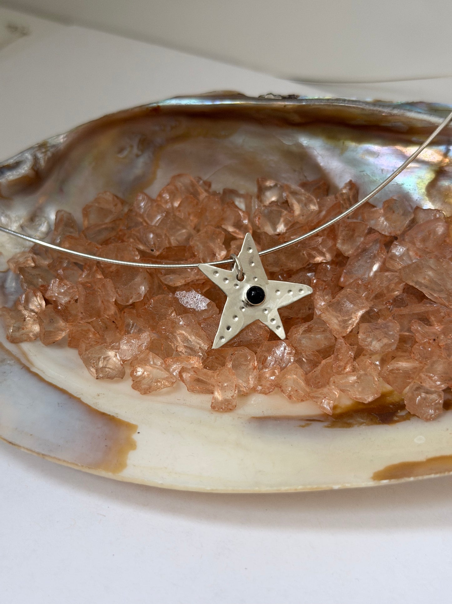 wonky star with black onyx